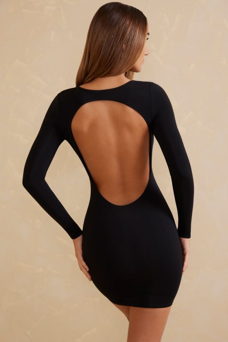 Oh Polly Bayan Long Sleeve Open Back Mini Dress Mini Dress Black | AVPO-42309